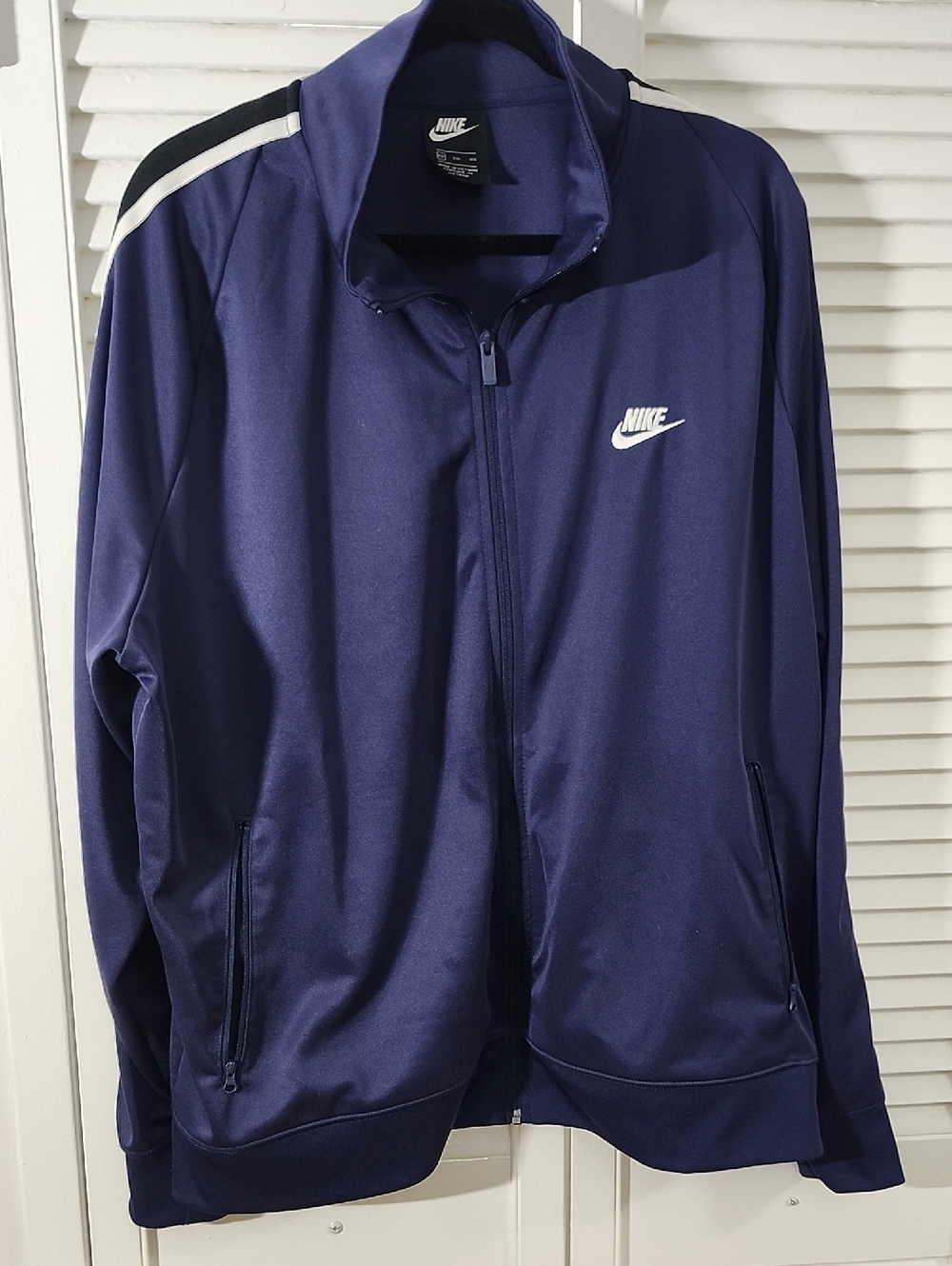Nike Navy Track Jacket with White Logo and Shoulder Stripe